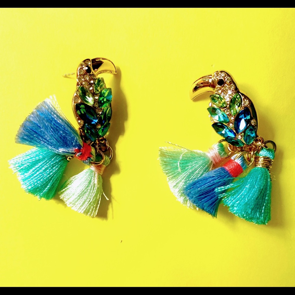 Toucan themed stud earrings. Never worn. Pristine condition.
